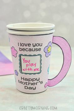 a coffee cup with the words i love you because you play with me