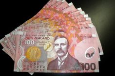 the new zealand 100 dollars bill is displayed