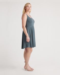 Our popular Tencel Jersey Fit & Flare Dress now comes in a mini version! Made with the same luxurious Tencel™ fabric , this dress this dress features a flattering fit-and-flare silhouette that accentuates your curves and creates a feminine look. The mini length adds a fun and flirty touch, making it perfect for a night out or a casual day in the sun. Dress it up with heels and statement jewelry for a night out, or pair it with sneakers and a denim jacket for a casual daytime look  | Quince | Wom Flattering Fit And Flare Knee-length Mini Dress, Flattering Knee-length Fit And Flare Mini Dress, Fit And Flare Sundress In Mini Length, A-line Sundress For Daywear, Knee-length Fit And Flare Mini Dress For Daywear, Fit And Flare Sundress Mini Length, Summer Fit And Flare Sundress, Fitted Mini Hem Daywear Dresses, Fit And Flare Midi Sundress