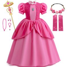 Behold the Princess Pink Fairy Dress for Girls, a magical ensemble that will make your little one feel like the belle of the ball! This stunning dress is the perfect choice for any young girl who loves to dream and play. Crafted with exquisite attention to detail and made from the highest quality materials, this Peach Princess Peach Dress, Princess Peach Costume, Princess Peach Cosplay, Peach Cosplay, Peach Costume, Baby Costumes Girl, Costume For Girls, Dirndl Outfit, Strapless Tube Dress