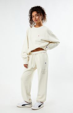 PacSun exclusive! Elevate your loungewear game with the Champion x PAC 1980 Sweatpants, designed for comfort and style. Featuring a high-rise fit with an interior drawstring waistband, side hand pockets, and elastic ankle cuffs, these sweatpants offer a cozy yet tailored look. Complete with a soft-touch PacSun graphic and iconic Champion logo C embroidery, they're the perfect blend of fashion and function for your everyday wardrobe.


	Solid color sweatpants
	High-rise
	Interior drawstring waistband
	Side hand pockets
	Champion C embroidery
	PacSun graphic
	Elastic ankle cuffs
	82% cotton, 18% polyester
	Machine washable
	Model is wearing a size medium
	Model measurements: 5’6” height, 30” bust, 25.5” waist, 36.5” hip Sportswear Loungewear Bottoms With Drawstring, Sportswear Lounge Pants With Drawstring, Sportswear Lounge Bottoms With Drawstring, Drawstring Sportswear Bottoms For Loungewear, Drawstring Bottoms For Loungewear Sportswear, Drawstring Bottoms For Loungewear, Champion Sweatpants Outfit, Sweatpants Aesthetic, Patchwork Sweatpants