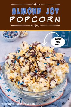 a bowl filled with popcorn on top of a table