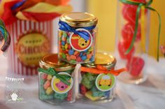 candy jars with winnie the pooh candies in them