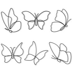 a set of six metal butterflies on a white background