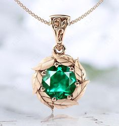 We are Pleased to welcome you in our Store-    TheLesBijoux Short Description about the item-  This Pendant is Made With a Round Cut Emerald Gemstone and the accented stones in this Pendant., are the Moissanite to adorn the look of this beautiful Pendant.. a unique piece to wear occasionally or can be used regularly. Can be offered as a gift to your loved ones, to make them feel special. MATERIAL AVAILABILITY- ( 925 Sterling Silver/ 14k solid gold(white gold / rose gold / yellow gold?  950 Solid Platinum  We make sure that you know that you're getting high quality hand-made crafted jewelry when you purchase items from our store. This beautiful Pendant.. is made to order. Available in all the Required Materials. ( 925 Sterling Silver/ 14k/18k solid gold(white gold / rose gold / yellow gold Art Deco Emerald, Necklace Art Deco, Necklace Art, Emerald Wedding, Pendant For Women, Emerald Pendant, Necklace Unique, Statement Pendant, Leaf Necklace