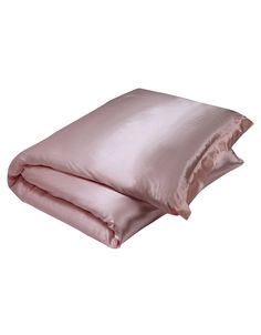 the pink satin sheets are folded on top of each other