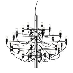 a large chandelier with many lights hanging from it's center pole,