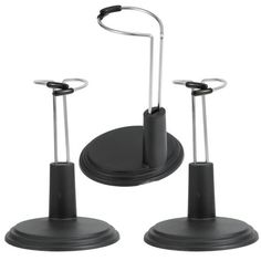 two black umbrella holders with metal handles