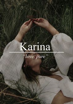 a woman laying in the grass with her hands on her head and text reading karna love, pure