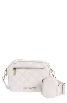 Tonal hardware and puffy quilts add on-trend appeal to a crossbody bag with a sized-down interior for essentials only. 6" x 8.75" x 3" Synthetic Imported Trendy Quilted Crossbody Shoulder Bag, White Quilted Rectangular Shoulder Bag, Trendy White Quilted Shoulder Bag, White Quilted Crossbody Shoulder Bag, Modern Quilted Crossbody Shoulder Bag, Modern Quilted Crossbody Bag, Puffy Quilts, Puffy Quilt, Quilted Crossbody Bag