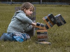 "Looking for a fun and engaging game to play with friends and family? Look no further than our handcrafted wooden Tumbling Tower Game! Made from alder wood, this game is built to last and is perfect for indoor and outdoor play. Also known as the block tower game, our Tumbling Tower Game is a great way to bring people together and have a blast! Whether you call it the tricky tower, toppling tower, or wobble tower, this game is sure to provide hours of entertainment for all ages. Best for 2-10 players.  To play, stack the wooden blocks in a tower formation, with each layer consisting of three blocks placed perpendicular to the previous layer. The tower should have 18 layers in total. Players then take turns carefully removing one block at a time from the tower and placing it on top. The goal Tower Falling, Tower Games, Play With Friends, Tower Stand, Garden Games, Family Look, Lawn Games, Alder Wood, Family Entertainment