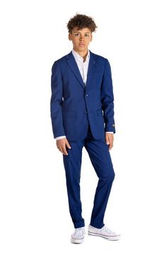 Fashion is always changing, but some outfits are too cool to go out of style. This suit is a fancy way to show your kiddo's perfect mix of fun and play. It's easygoing but stylish enough to wear on bog occasions like weddings. The blue classic color and minimalist design will make you feel good and leave a great impression. Includes jacket and trousers Jacket has notched lapels; nonfunctional three-button cuffs; chest welt pocket; front flap pockets; side vents Trousers have zip fly with button- Teen Boy Dress Clothes Modern, Blue Shorts Outfit, Garden Cocktail, Navy Suit Wedding, Wedding Outfit For Boys, Junior Groomsmen, Suits And Sneakers, Wedding Guest Outfit Fall, Dance Attire