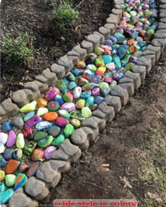 there are many rocks that have been made into a garden path