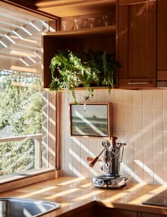 the kitchen counter is clean and ready to be used as a coffee maker or espresso machine