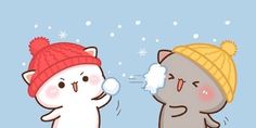 two cats wearing winter hats and one is blowing snow on his nose while the other cat looks at him