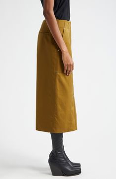 Classic utilitarian style defines a cotton-twill pencil skirt that's a versatile closet staple. 34 1/2" length Front button closure Front slant pockets; back welt pockets 100% cotton Dry clean Imported Fall Cotton Cargo Skirt With Relaxed Fit, Cotton Skirt With Relaxed Fit For Work, Relaxed Fit Cotton Skirt For Work, Spring Workwear Pencil Skirt With Pockets, Knee-length Relaxed Cotton Cargo Skirt, Spring Cotton Pencil Skirt With Pockets, Fall Workwear Pencil Skirt With Pockets, Utility Cotton Skirt For Fall, Relaxed Cotton Knee-length Cargo Skirt