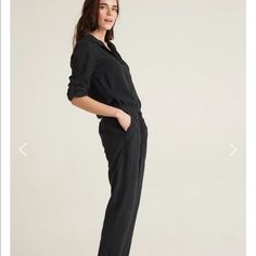 Never Worn, Black Utility Junpsuit, Size Small, No Tags, Only Tried On. Draw String Waist, Tie Up Sleeves, Button Chest, Super Comfy! Elegant Relaxed Fit Jumpsuit For Work, Casual Black Pantsuit For Work, Casual Black Pantsuit With Pockets, Black Relaxed Fit Jumpsuit For Workwear, Dark Wash Utility Denim Jumpsuit, Chic Button-up Jumpsuits And Rompers For Loungewear, Black Button-up Jumpsuit For Work, Black Denim Utility Jumpsuit, Chic Relaxed Fit Button-up Jumpsuit