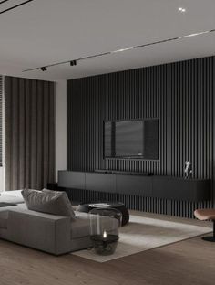 a modern living room with black and white striped walls