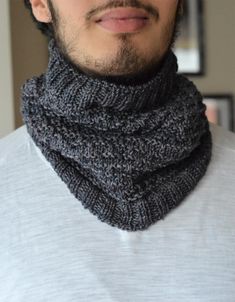 a close up of a man wearing a knitted cowl neckwarmern