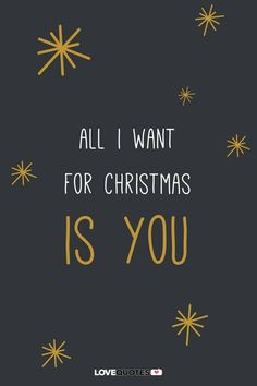 the words all i want for christmas is you on a black background with gold stars