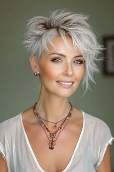 Short Hair Necklines For Women, Pixie With An Undercut, Pixi Hair 2024, Pixie Haircut Grey Hair, Fun Pixie Hairstyles, Old Woman Haircut, White Hair With Lowlights Older Women, Undercut Pixie Haircut For Older Women, Short Hair For Fine Hair