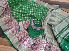 Blouse stitched - Yes Blouse Opening - Front Sleeves Length - Elbow Padded - No Blouse size - 40 with inner margins expandable upto 46 For Blouse Size 38 alteration can be done on request. Fall/pico - Yes done Traditional Green Blouse With Patterns, Green Traditional Patterned Blouse, Green Banarasi Silk Handloom Blouse, Green Banarasi Silk Blouse With Motifs, Green Art Silk Blouse With Traditional Patterns, Fitted Green Blouse With Traditional Patterns, Green Handloom Blouse With Traditional Drape, Traditional Drape Handloom Green Blouse, Green Blouse With Traditional Patterns And Drape