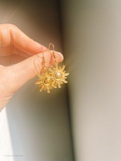 “I've been waiting for you a long time, Alina" He said. "You and I are going to change the world.” Vintage sun pendant, featuring Alina's sun summoner power, on a medium thickness silver hoop. Inspired by Leigh Bardugo's Shadow and Bone trilogy / Grishaverse. When the sun hits these earrings watch Alina's power come to life! Want a matching set? Check out The Sankta Alina Vintage necklace. Readers Society has a ton of fun Grisha based items for you to discover. Celestial Sun Design Round Jewelry, Celestial Metal Jewelry, Adjustable Celestial Sun Design Jewelry, Adjustable Celestial Jewelry With Sun Design, Gold Sterling Silver Jewelry For Summer, Spiritual Style Jewelry For Summer Gifts, Spiritual Jewelry As Summer Gift, Spiritual Jewelry For Summer Gifts, Everyday Round Sun Design Jewelry