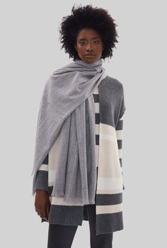 This lightweight scarf is adorned with graceful lines of shimmering crystals, adding a touch of elegance to any James Lakeland ensemble.  83% Polyester, 17% Viscose       Hand wash only. No bleaching. No tumble dry. No machine wash.   Made in China Hand wash only. No bleaching. No tumble dry. No machine wash. Elegant Gray Scarves For Fall, Elegant Shawl For Layering, Elegant Gray Shawl For Winter, Family Heritage, Artisan Gift, Lightweight Scarf, Mens Jewelry Bracelet, Fine Fabric, Fashion Jewellery