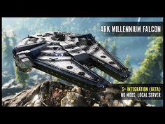 the millennium falcon model is on display in front of a mountain scene with trees and mountains