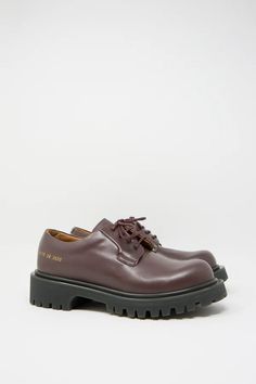 Common Projects - Chunky Derby Article Shoe in Burgundy | Oroboro • Luxury Boutique • New York, NY Brown Lace-up Shoes With Lug Sole, Brown Plain Toe Lace-up Shoes With Lug Sole, Derby Lace-up Shoes With Round Toe And Lug Sole, Burgundy Lace-up Oxfords With Leather Sole, Burgundy Oxfords With Rubber Sole And Plain Toe, Leather Shoes With Lug Sole For Derby, Plain Toe Leather Shoes With Lug Sole For Derby, Formal Closed Toe Oxfords With Vibram Sole, Derby Boots