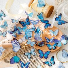 many blue butterflies on a wooden plate