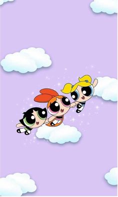 the powerpuff girls flying through the sky with their heads turned to look like they are