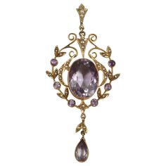 Edwardian style 9-karat & amethyst with seed pearl accents drop pendant stamped JNW. Very nice condition. Dimensions: 3" total length x 1.5" wide and weighs 8.1 grams. Vintage Jewelry Antique, Art Nouveau Pendant, Edwardian Jewelry, Edwardian Style, Neck Jewellery, Vintage Antique Jewelry, Antique Necklace, Vintage Pendant, Edwardian Fashion