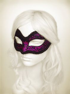 Venetian style masquerade mask covered black lace on metallic fuschia surface. Framed with black braided trim, small black rhinestones on the corners of the eyes. Your order will be delivered in 3-5 business days with online tracking by DHL or UPS. PAYMENT: Following your order placement, Fitted Masquerade Mask For Mardi Gras, Purple Eye Mask For Costume Party, Purple Mask For Costume Party, Black Gothic Fitted Masquerade Mask, Black Gothic Masquerade Mask, Masquerade Mask Lace, Pink Masquerade Mask Full Face, Magenta Masquerade Mask, Super Power Girl