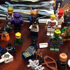 many legos are sitting on the table with each one's own toy figure