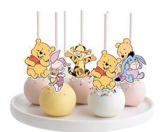 winnie the pooh birthday cake pops with candles