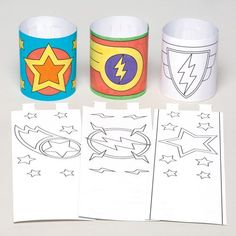 three paper cups with different designs on them, one has lightning and the other has stars