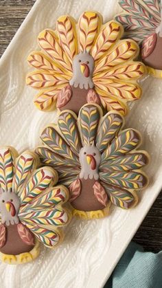 decorated turkey cookies on a white platter