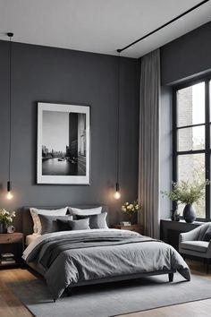 a bedroom with grey walls and wooden floors