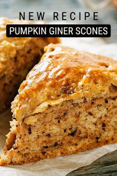 a close up of a piece of cake with text overlay that reads new recipe pumpkin giner scones