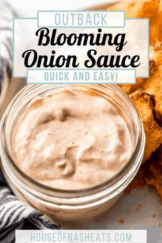 a close up of an onion sauce in a glass jar with the text overlay reading outback blooming onion sauce quick and easy