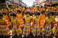 a group of people dressed in colorful costumes