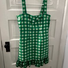 Green Gingham Cynthia Rowley Dress, Size 6. Cute Ruffle Detail At The Bottom. Never Worn. Green Cotton Mini Dress For Picnic, Chic Green Mini Dress For Picnic, Spring Plaid Lined Mini Dress, Preppy Sleeveless Dress For Picnic, Preppy Gingham Dress For Picnic, Green Plaid Dress For Spring Picnic, Green Plaid Summer Dress For Picnic, Sleeveless Fitted Plaid Dress For Brunch, Fitted Sleeveless Plaid Dress For Brunch