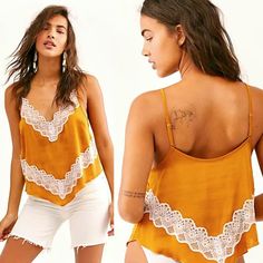 This Gorgeous Fp Camisole Is All Sexy Angles With Its Handkerchief Hem & Deep V-Neckline. Exquisite Lace Detailing Softens It For A Piece That Is Fierce & Feminine. In A Stunning Pumpkin Spice Color With White Lace Overlay Across The Front & Back, It Looks Beautiful With White Shorts, Leggings & Jeans Or Wear It Under A Jacket Or Sweater For A Flirty Look. Easy To Dress Up Or Down With Your Favorite Jewelry. With Adjustable Shoulder Straps. 100% Polyester. Approx. Bust, Length. Nwt Lace Camisole, Handkerchief Hem, Jean Leggings, Lace Overlay, Free People Tops, Your Eyes, Pumpkin Spice, Lace Detail, Shoulder Straps