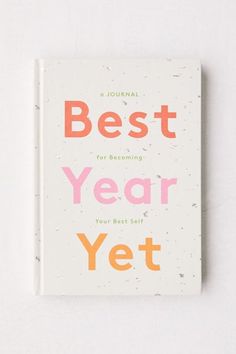 a book with the title'best year yet'written in orange and pink on it