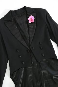 "RARE Antique Vintage museum quality 1920s boys wool tuxedo suit tails Cropped fit with satin collar and bright pink satin flower pin Satin buttons with single satin button closure Wool tuxedo pants with metal zipper, side pockets & 2 back pockets (pockets lined in cotton) Excellent condition! Made very well M e a s u r e m e n t s: Size: unsure on childs size, please see all measurements for accurate fit. All taken while garment is laying flat Blazer: --------------------------- Bust: 14 1/ Elegant Fitted Suits For Costume, Elegant Fitted Tuxedo For Costume, Tuxedo With Tails, Tuxedo Pants, 1980s Dresses, Tuxedo Suit, Black Tuxedo, Satin Flowers