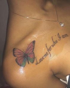 a woman's breast with a butterfly tattoo on her left side and the words love, hope, and am written in cursive