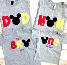 three shirts with mickey mouse and minnie mouse heads on them, one has the word'd