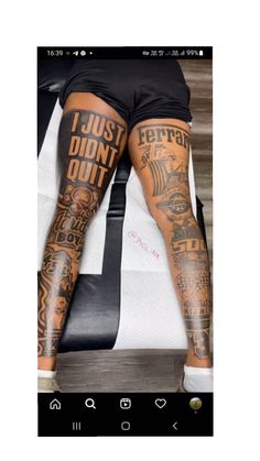 a person with tattoos on their legs