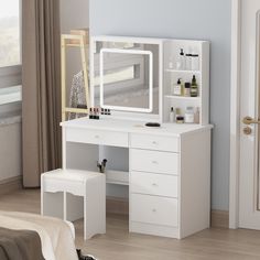 a white dressing table with a mirror, stool and shelf next to the door in a bedroom